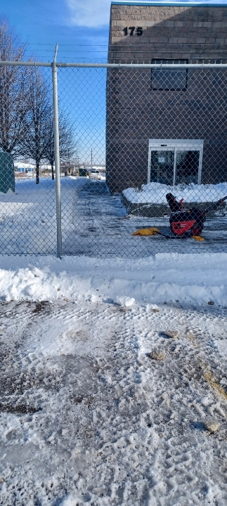 Snow cleared from the entrance and access area of a commercial building