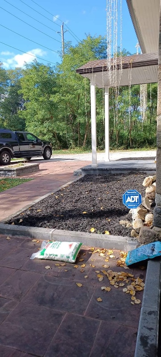 Finished front garden bed with fresh mulch